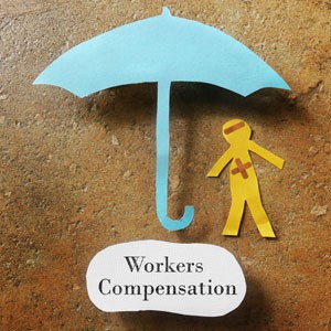 A statue under an umbrella - Workers’ Comp Eligibility